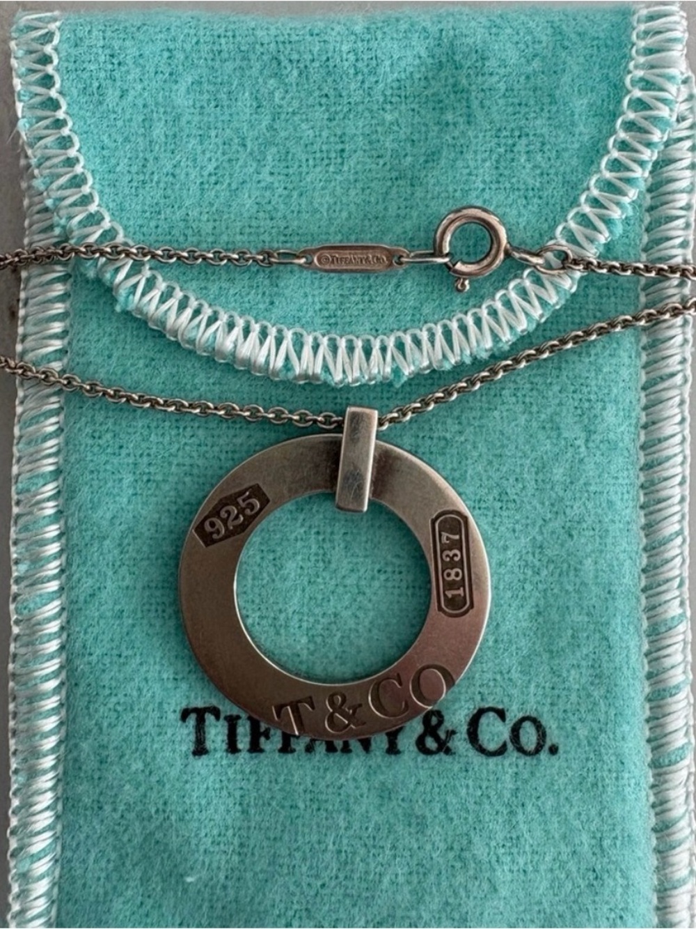 Tiffany & Co. Silver Ring Pendant Necklace with Tiffany Blue Accents
